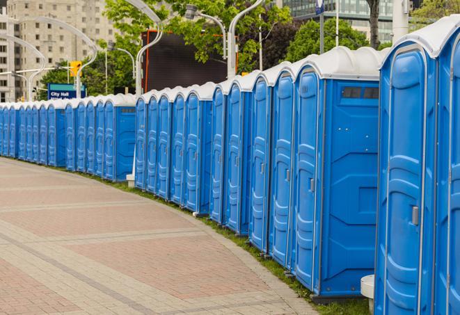 a row of portable restrooms at a fairground, offering visitors a clean and hassle-free experience in frederick
